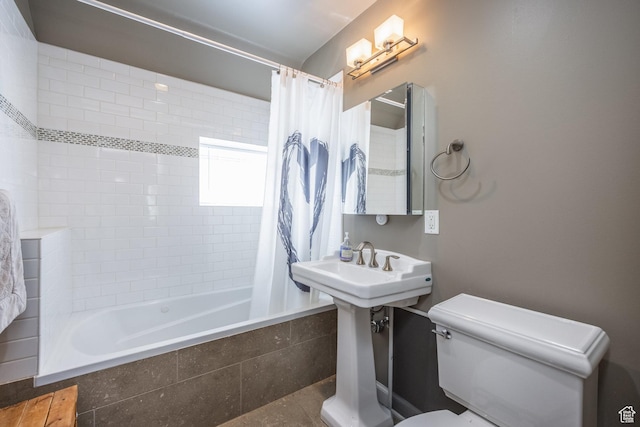1677 E Yalecrest Ave, Salt Lake City, UT 84105 - bathroom with toilet and tiled shower / bath combo