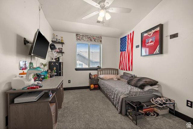 bedroom featuring carpet floors, baseboards, and ceiling fan