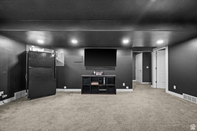 carpeted cinema room featuring baseboards and recessed lighting