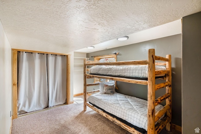 2013 N River View Cir, Huntsville, UT 84317 - carpeted bedroom with a textured ceiling and baseboards