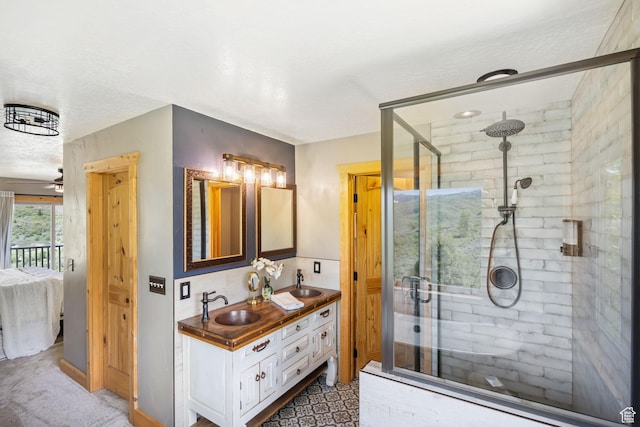 2013 N River View Cir, Huntsville, UT 84317 - full bathroom with a shower stall, double vanity, and a ceiling fan