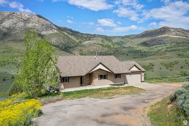 2013 N River View Cir, Huntsville, UT 84317 - ranch-style house with driveway, a garage, and a mountain view