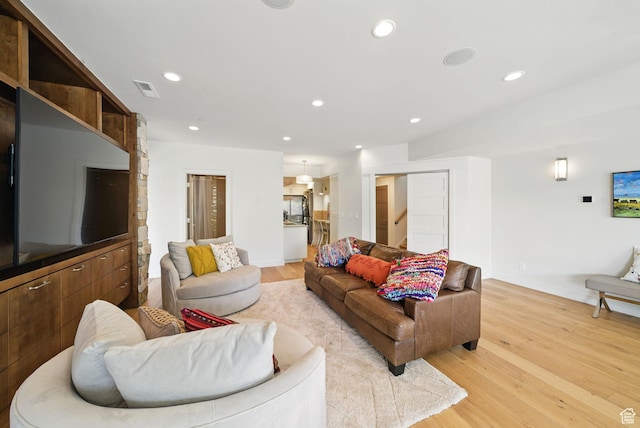 732 S Nebo Cir, Woodland Hills, UT 84653 - living room featuring light wood finished floors, baseboards, and recessed lighting