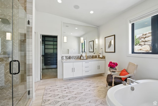 732 S Nebo Cir, Woodland Hills, UT 84653 - full bath featuring a stall shower, a soaking tub, double vanity, recessed lighting, and lofted ceiling