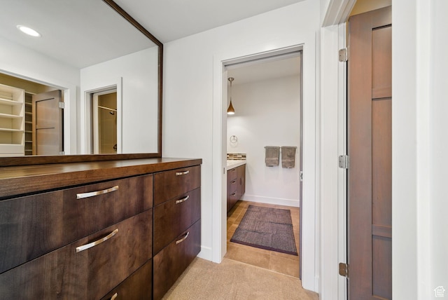 732 S Nebo Cir, Woodland Hills, UT 84653 - bathroom with vanity, tile patterned floors, recessed lighting, and a walk in closet