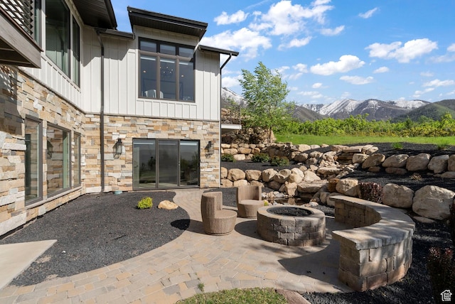 732 S Nebo Cir, Woodland Hills, UT 84653 - view of patio featuring an outdoor fire pit and a mountain view