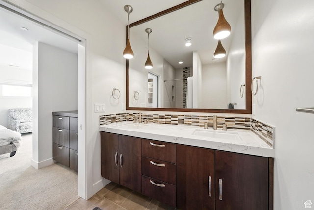 732 S Nebo Cir, Woodland Hills, UT 84653 - bathroom featuring tasteful backsplash, double vanity, and connected bathroom