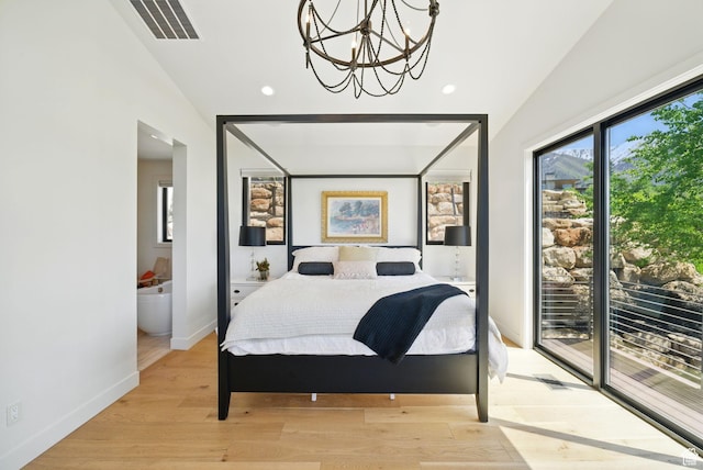 732 S Nebo Cir, Woodland Hills, UT 84653 - bedroom with lofted ceiling, access to outside, a chandelier, recessed lighting, and light wood-style flooring