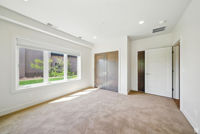 732 S Nebo Cir, Woodland Hills, UT 84653 - unfurnished bedroom with light carpet, baseboards, a closet, and recessed lighting