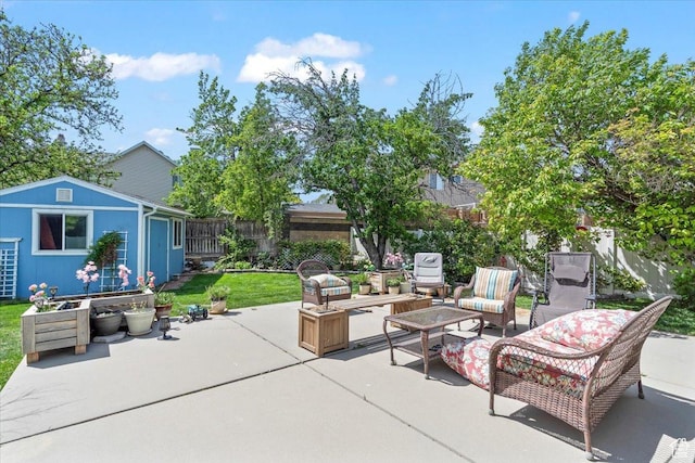 view of patio featuring outdoor lounge area and an outdoor structure