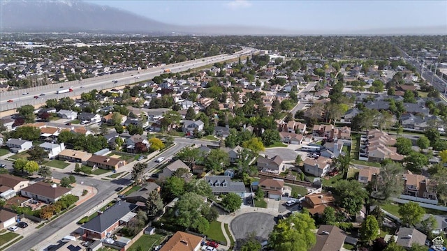 aerial view of property's location featuring nearby suburban area