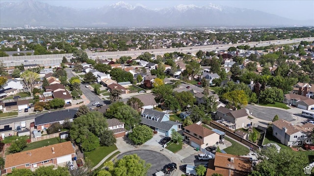 view of property location with nearby suburban area and a mountain backdrop