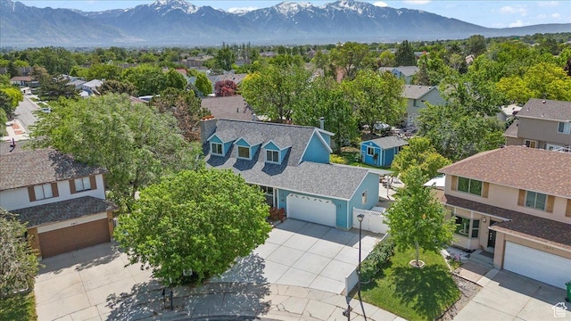 aerial view of residential area with mountains