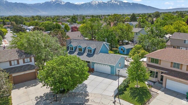 aerial view of residential area with mountains