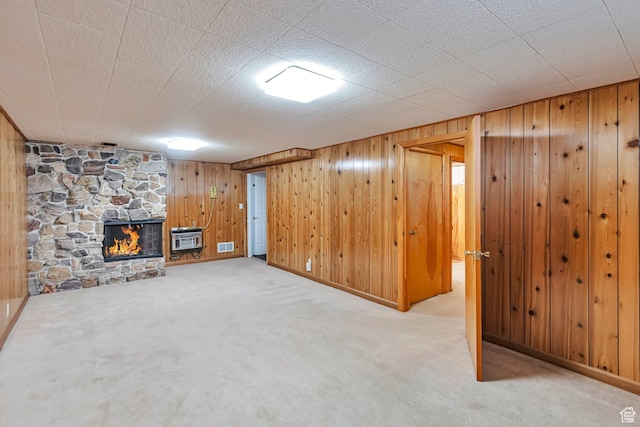 274 N 400 E, Hyde Park, UT 84318 - finished below grade area featuring carpet, a fireplace, wood walls, heating unit, and baseboards