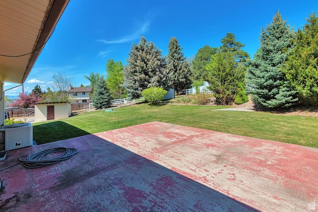 274 N 400 E, Hyde Park, UT 84318 - view of patio featuring a shed and an outbuilding