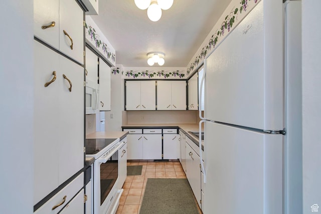 274 N 400 E, Hyde Park, UT 84318 - kitchen with white appliances, light tile patterned floors, white cabinets, and light countertops