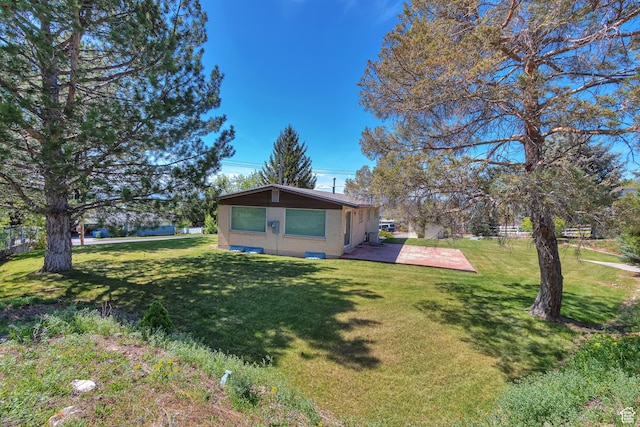274 N 400 E, Hyde Park, UT 84318 - view of home's exterior with a lawn and brick siding