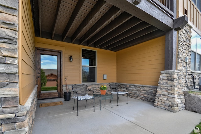 view of patio with a balcony
