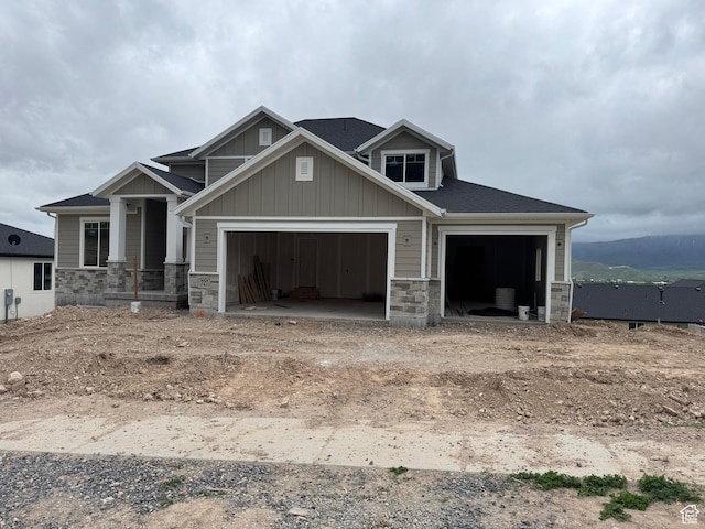 727 N Jenny Ln, Morgan, UT 84050 - craftsman house featuring stone siding, an attached garage, and board and batten siding