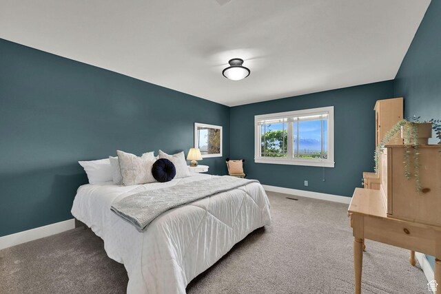 1274 E Chandler, Salt Lake City, UT 84103 - bedroom featuring baseboards and carpet