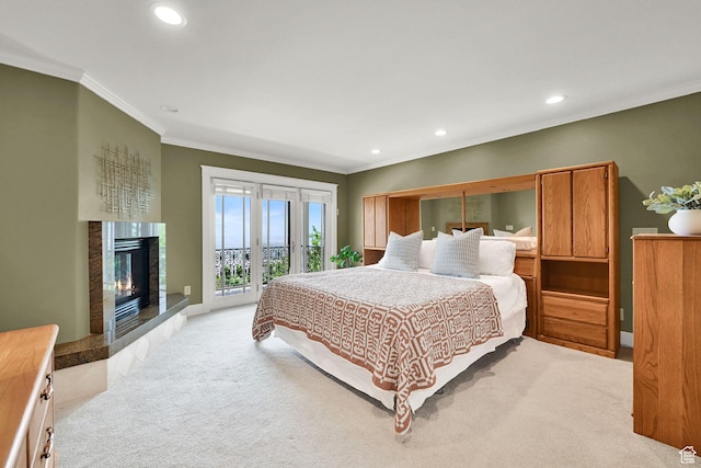1274 E Chandler, Salt Lake City, UT 84103 - bedroom featuring ornamental molding, access to outside, light carpet, recessed lighting, and a high end fireplace
