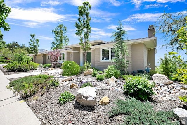 1274 E Chandler, Salt Lake City, UT 84103 - view of front facade featuring a chimney