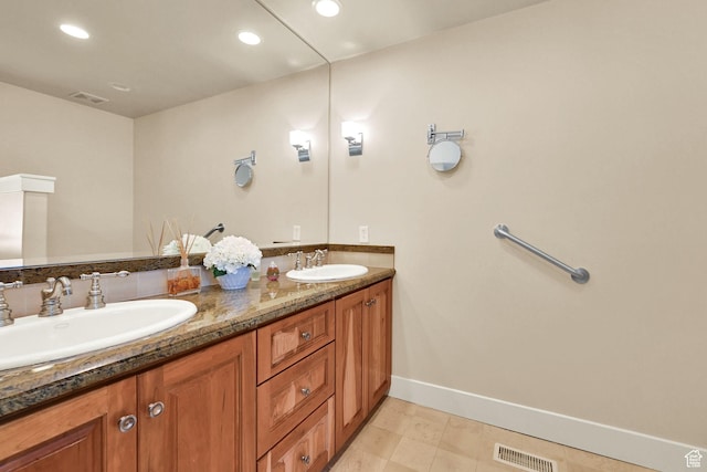 1274 E Chandler, Salt Lake City, UT 84103 - bathroom featuring double vanity, baseboards, recessed lighting, and tile patterned flooring