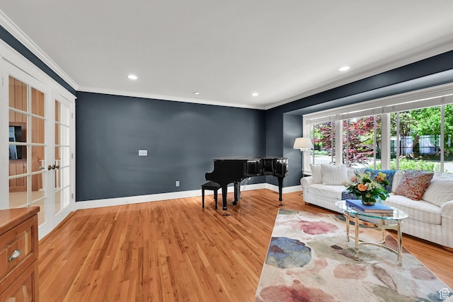 1274 E Chandler, Salt Lake City, UT 84103 - living room featuring ornamental molding, light wood-style floors, recessed lighting, baseboards, and french doors