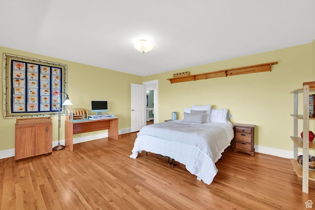 1274 E Chandler, Salt Lake City, UT 84103 - bedroom with light wood-style floors and baseboards