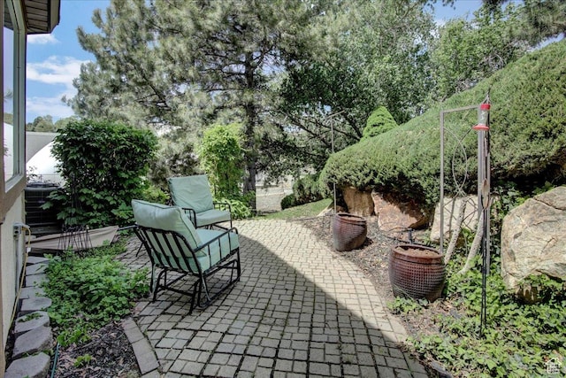 5812 Club View Ln, South Ogden, UT 84405 - view of patio featuring central air condition unit
