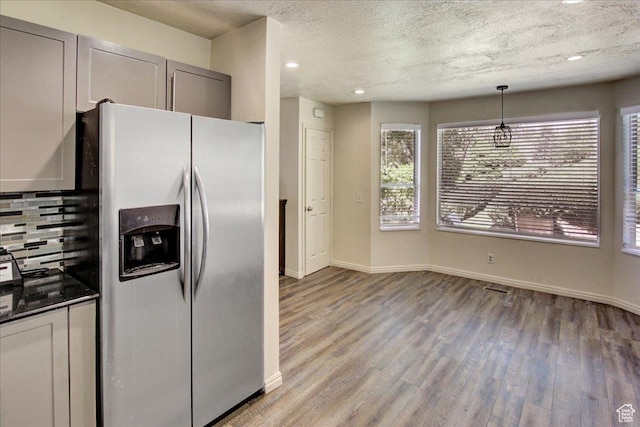5812 Club View Ln, South Ogden, UT 84405 - kitchen featuring stainless steel fridge, light wood finished floors, gray cabinetry, a textured ceiling, and decorative backsplash
