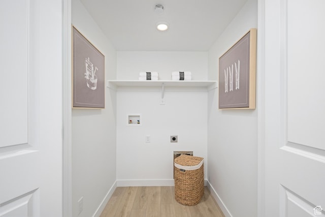 washroom with washer hookup, light wood-type flooring, electric dryer hookup, and baseboards