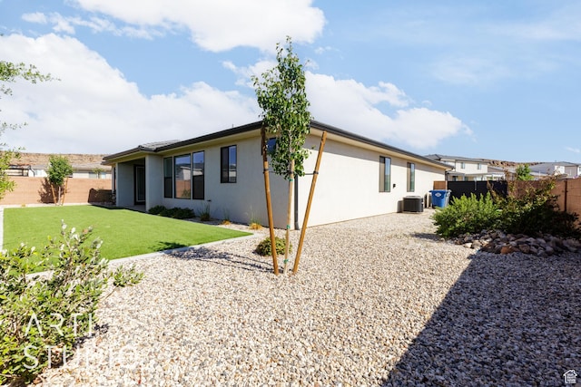 3551 E 3050th St S, St George, UT 84790 - back of property with stucco siding and central AC unit