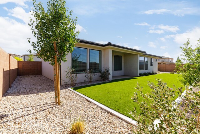3551 E 3050th St S, St George, UT 84790 - rear view of property with stucco siding