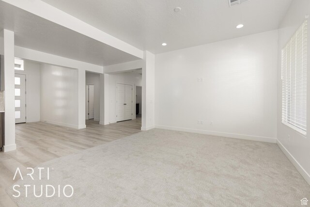 3551 E 3050th St S, St George, UT 84790 - spare room featuring light colored carpet, baseboards, and recessed lighting