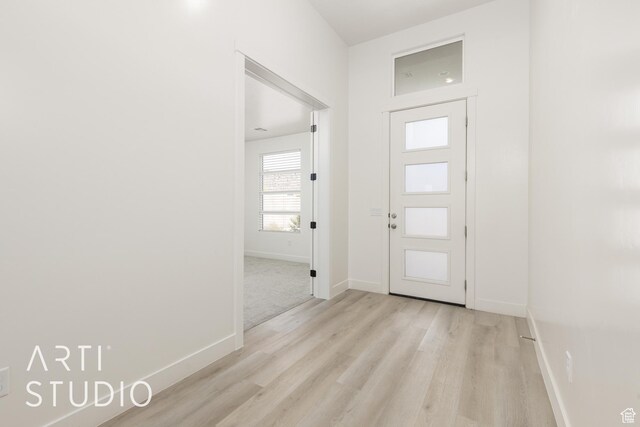 3551 E 3050th St S, St George, UT 84790 - foyer entrance with light wood-style flooring and baseboards