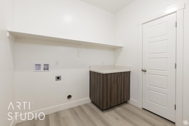 3551 E 3050th St S, St George, UT 84790 - laundry area featuring electric dryer hookup, light wood-type flooring, washer hookup, and baseboards