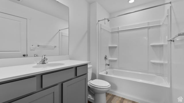 116 N Seaside St Unit 2317, Saratoga Springs, UT 84045 - full bathroom with toilet, wood finished floors, vanity, and  shower combination