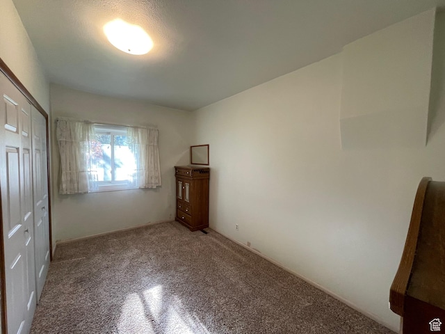 15 E Main, Wellsville, UT 84339 - unfurnished bedroom with light colored carpet and a closet