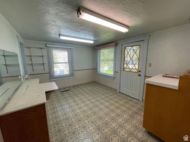 15 E Main, Wellsville, UT 84339 - doorway with a textured ceiling