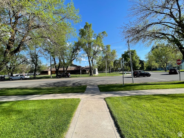 15 E Main, Wellsville, UT 84339 - view of asphalt road featuring sidewalks and traffic signs