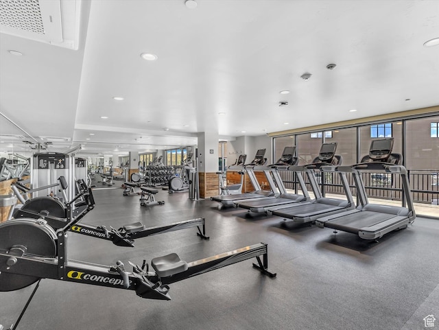 workout area featuring recessed lighting