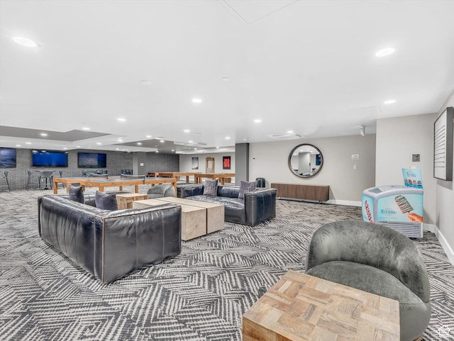 living area featuring carpet floors, recessed lighting, and baseboards