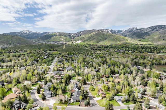 aerial perspective of suburban area featuring a mountainous background