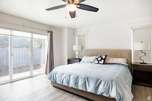 bedroom featuring access to exterior, light wood-type flooring, and ceiling fan