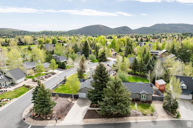 aerial view of residential area with mountains