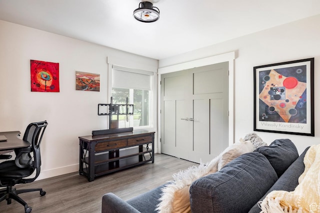office featuring wood finished floors and baseboards