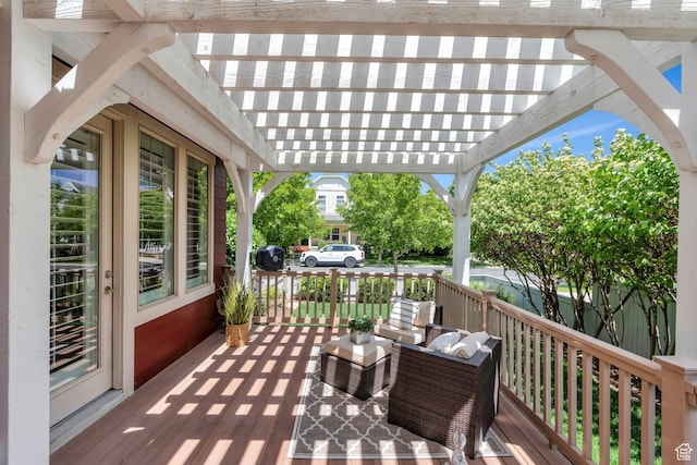 wooden terrace with a pergola