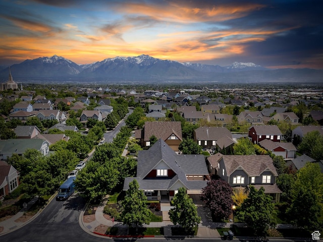 aerial view at dusk of a mountain view and a residential view